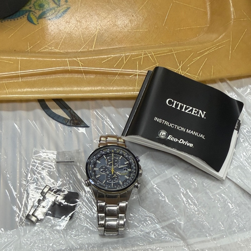 Citizen Eco-Drive Silver and Black Chronograph Watch blue angles